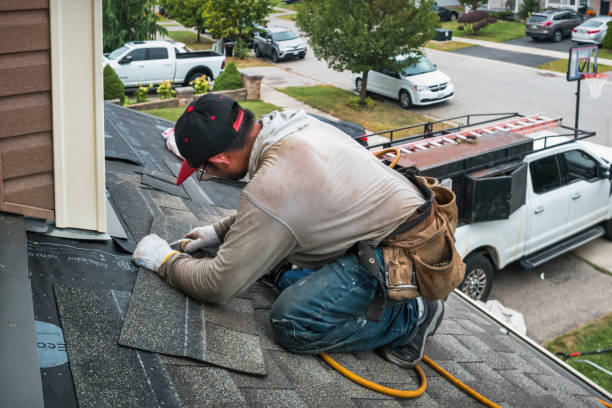Professional Roofing technician working in Manilla, IN